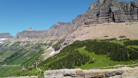 driving-on-a-road-surrounded-by-mountains