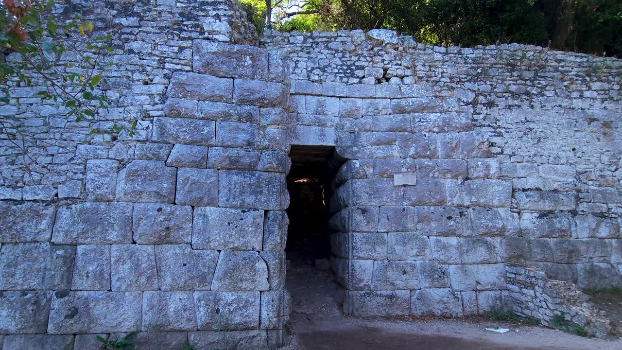 Ancient Stone Wall with Large Stones Stands Proud of Butrint's Archaeological Site, Echoing the Past