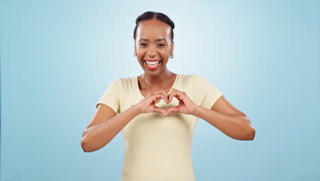 Heart,-hands-and-woman-love-you-in-studio