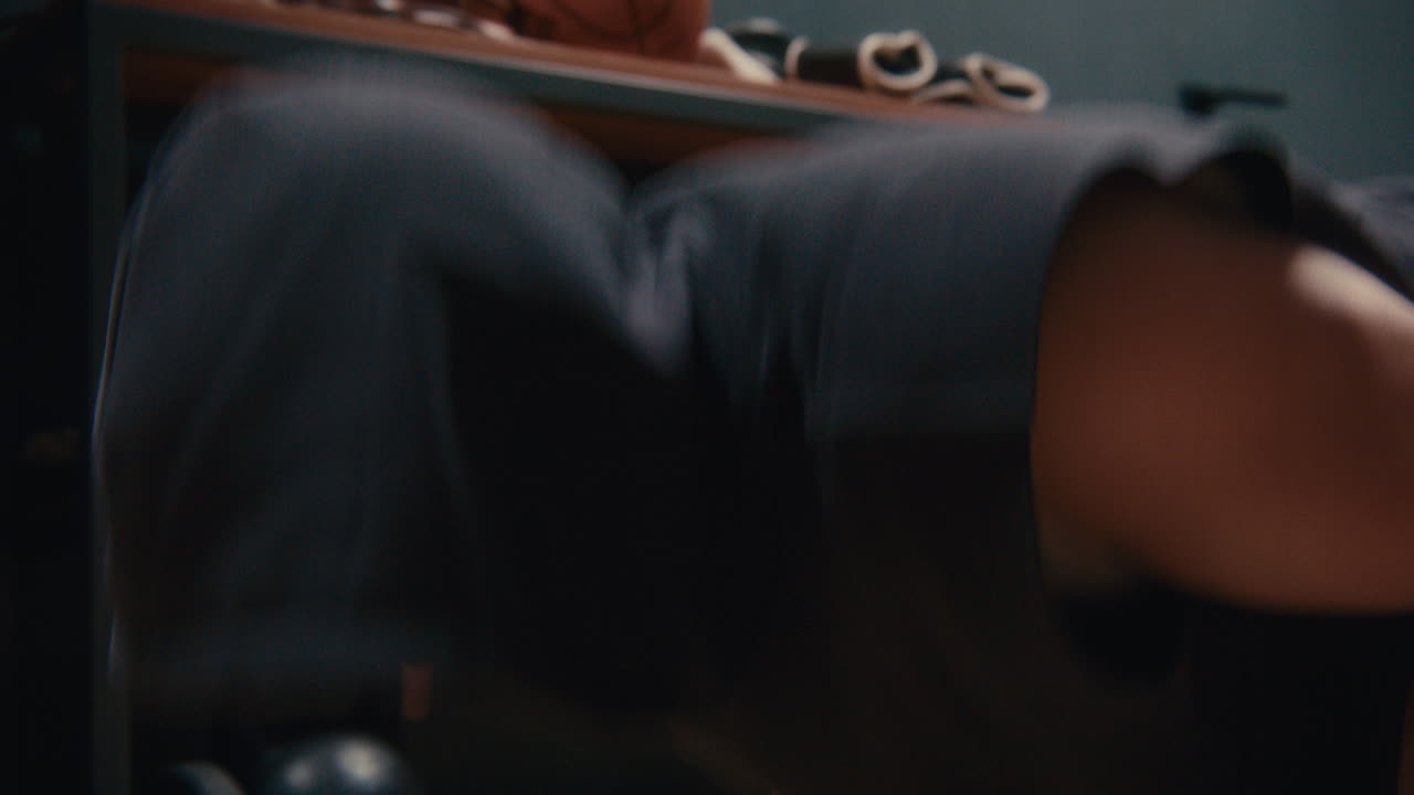 Person Performing Push-ups in Gym