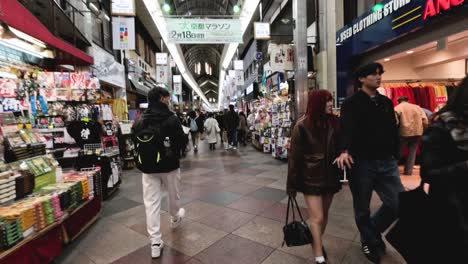 walking through a bustling indoor market