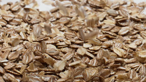 Preparing-oatmeal-natural-yogurt-for-breakfast-in-super-slow-motion-close-up.