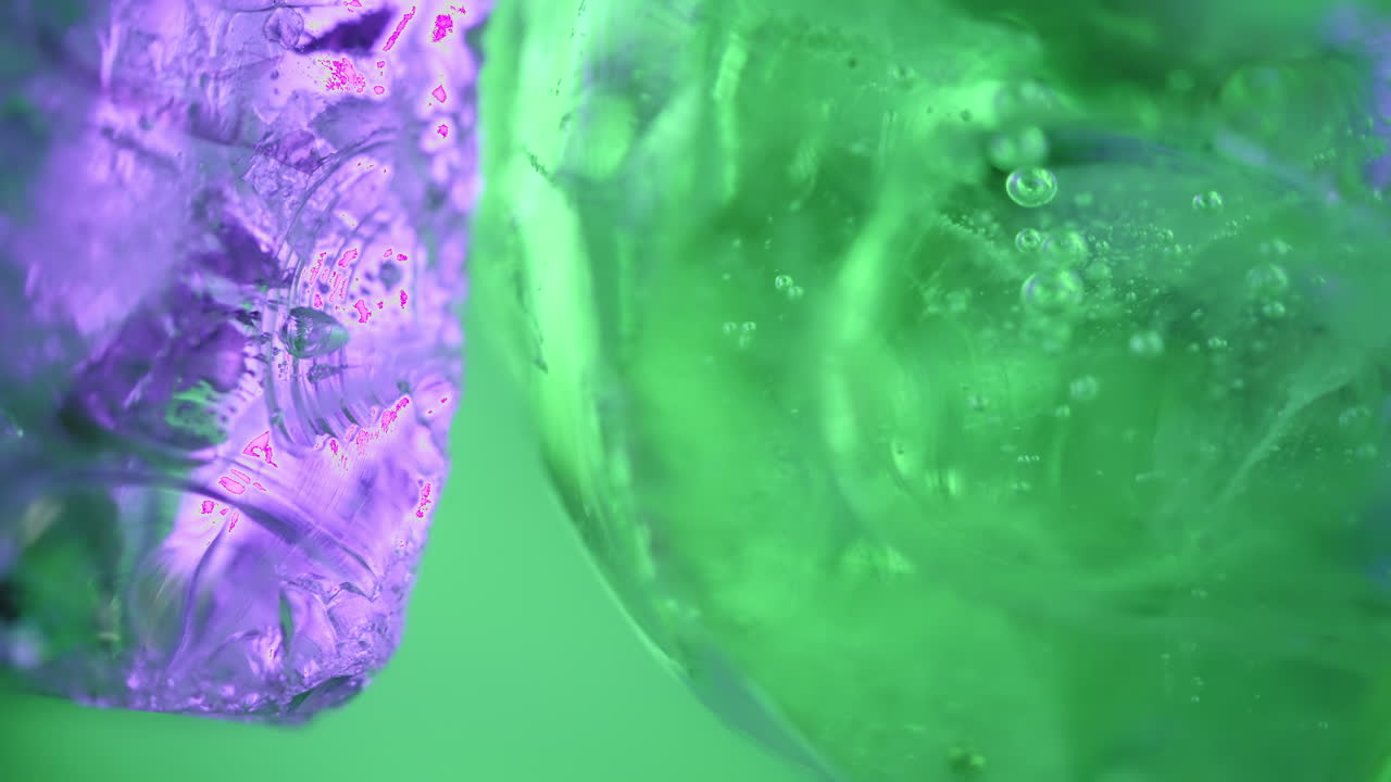 Green frozen crystals spinning, abstract background