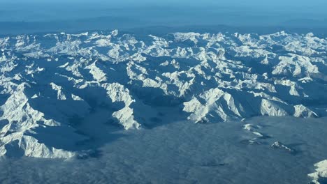 stunning pilot view of the pyrenees mountains flying from france to spain at 10000m high