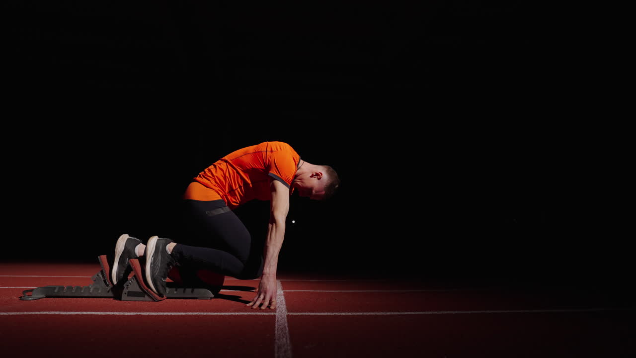 Sprinter in starting blocks