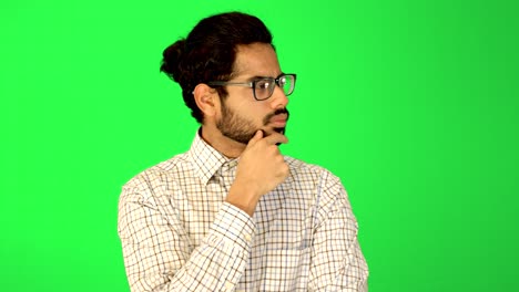 male-business-man-looking-left-and-right-with-green-background---green-screen