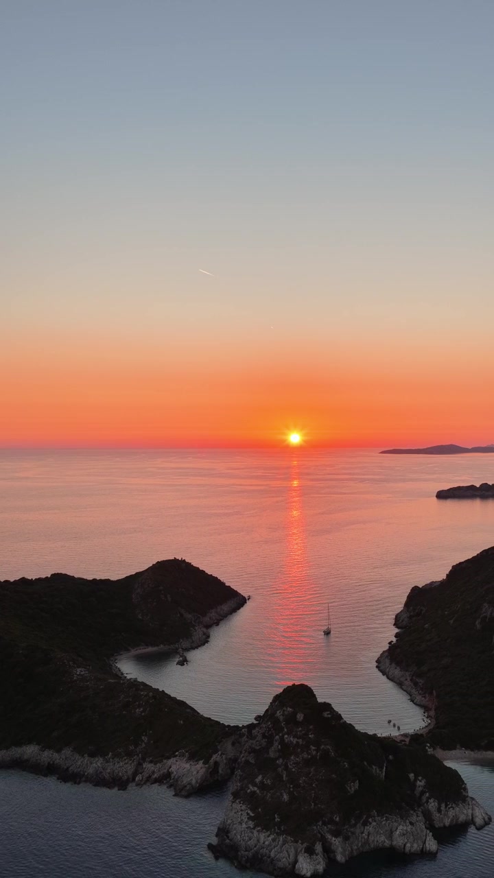 Vertical Drone Flight Over Porto Timoni Twin Beach and Scenic Coastline During Sunset, Corfu, Greece