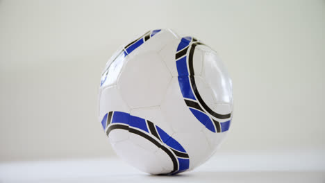 football kept against white background 4k