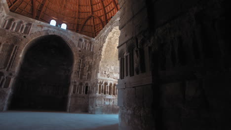 umayyad palace at jabal al qal'a, the citadel of amman, jordan. wide shot pan right, umayyad palace hall from inside. 4k