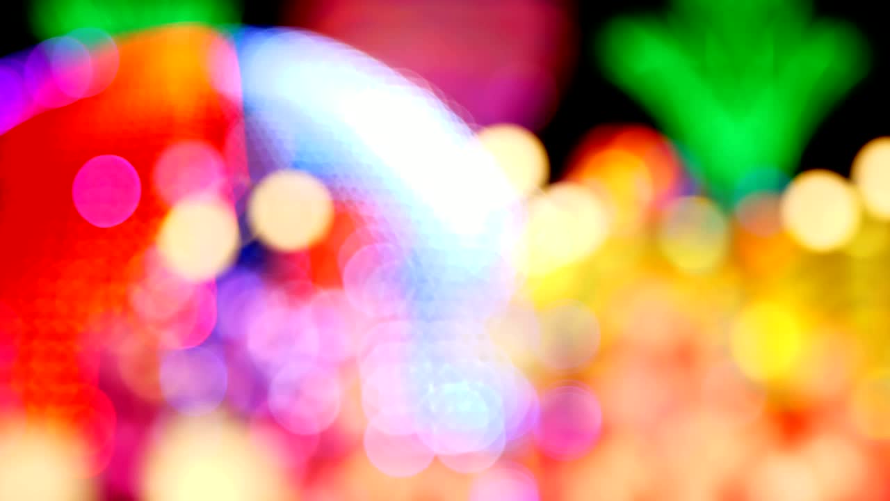 hermoso fondo de iluminación multicolor. primer plano, borroso, enfoque suave. luces bokeh abstractas desenfocadas, fondo iluminado multicolor