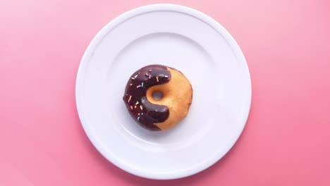 high angel view of chocolate donuts on plate