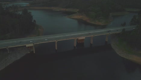 twilight-drone-aerial-shot-of-bridge-in-scenic-lights