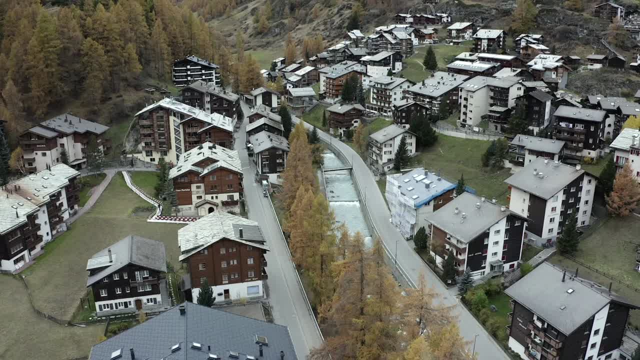 Aerial view of the swiss alps and houses in the beautiful and serene town of Zermatt, Switzerland