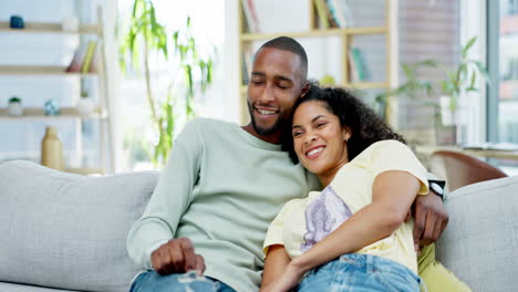 Relax,-sofa-and-couple-watching-tv-in-home