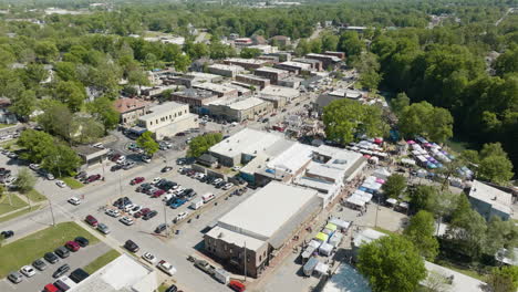 Aerial-View-Of-City-Of-Siloam-Springs-During-Dogwood-Festival-In-AR,-USA---drone-shot