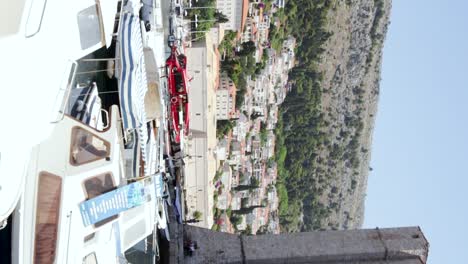 boat leaving the old town port