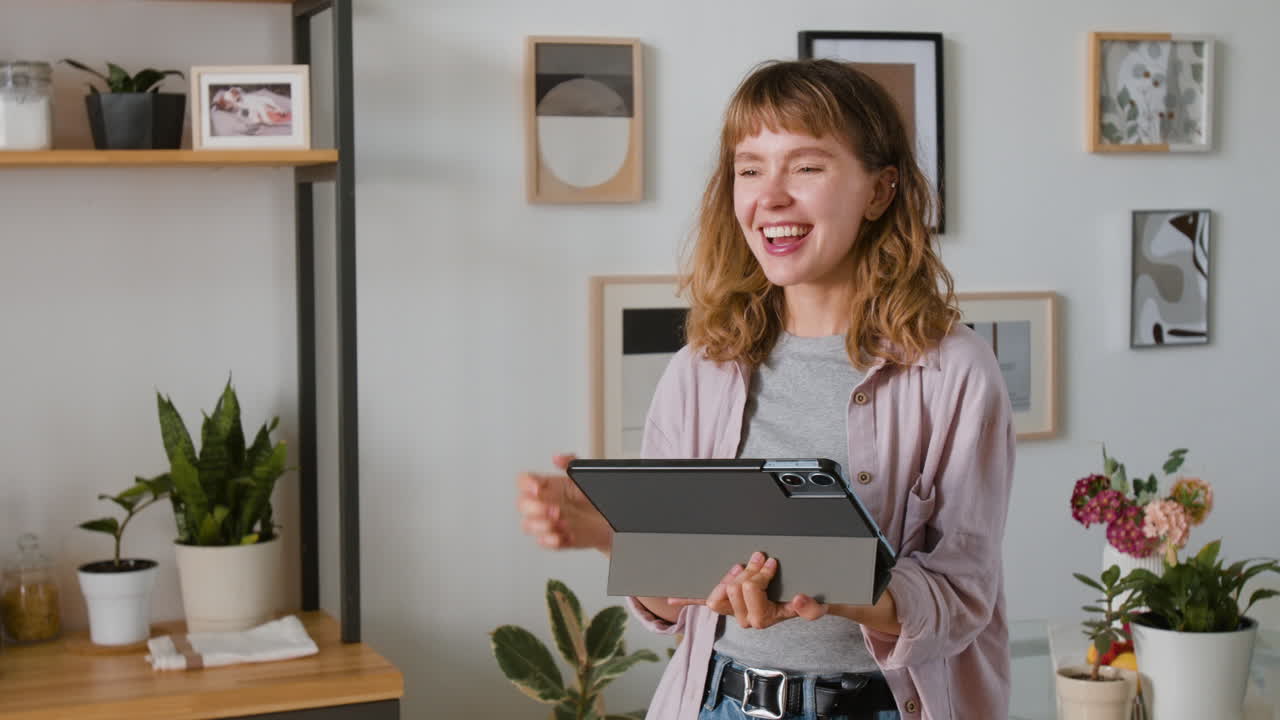 A woman indoors with a tablet