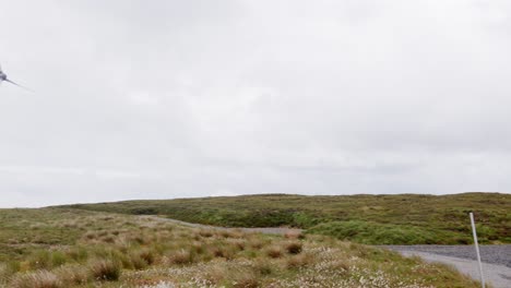 Shot-of-the-base-of-a-wind-turbine-tower-on-a-wind-farm-on-the-Hebrides