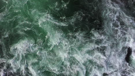 Birdseye-shot-of-the-roaring-waterfall-Rheinfall-at-Schaffhausen-in-Switzerland