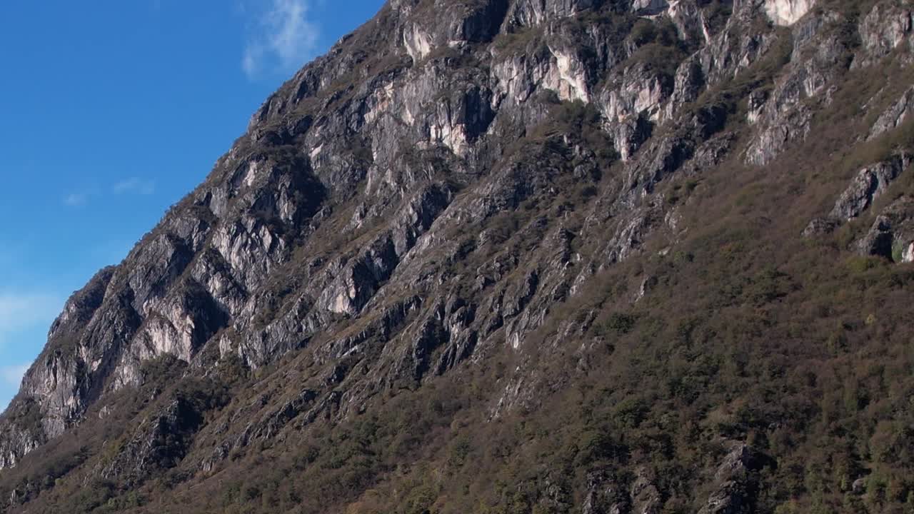 Dramatic aerial view of Italian Alps showcasing rugged mountain terrain