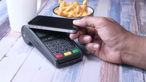 mobile payment at restaurant table