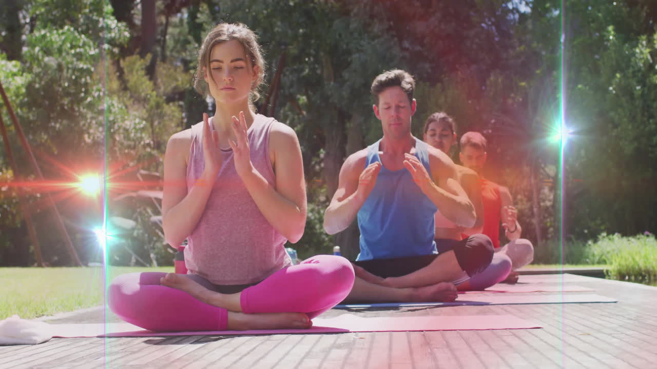 Practicing yoga outdoors, people with glowing light animation on chest area