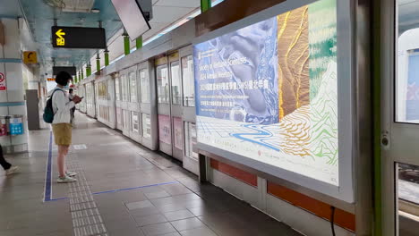 commuter waiting mrt in taipei taiwan with 4k resolution.