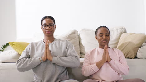 women doing yoga