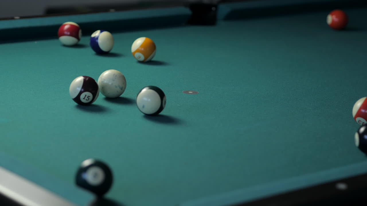 Medium Close Up of Golden Pool Break on Billiard Table