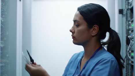 in a hospital environment, a healthcare worker arranges medical supplies, demonstrating attention to detail and commitment to organization during daytime hours.