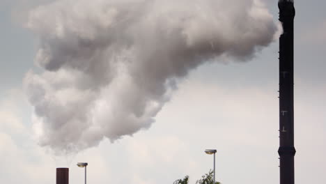 Air-pollution-caused-by-factory-smokestacks-emitting-hazardous-greenhouse-gases