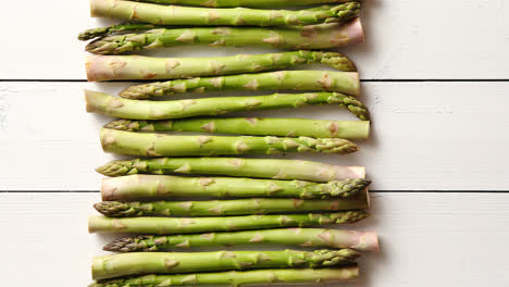 Above-view-of-flat-lay-organic-raw-uncooked-green-asparagus