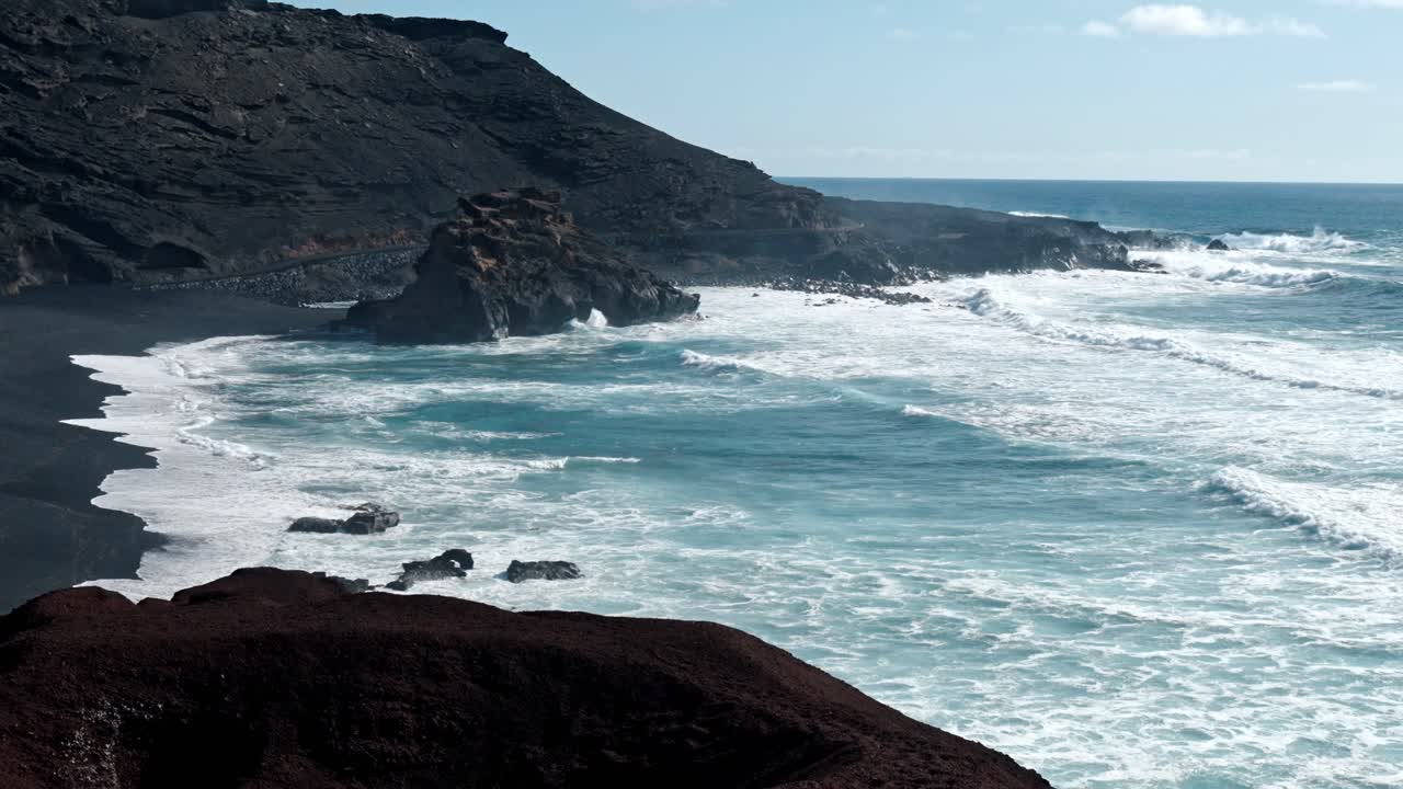 A stunning view of the iconic Green Lake Beach, also known as Laguna de los Clicos, located on the volcanic island of Lanzarote in the Canary Islands, Spain.