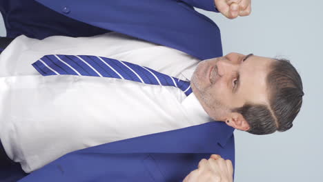 Vertical-video-of-Businessman-having-a-nervous-breakdown.