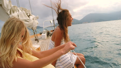 carefree cheerful young women laughing together