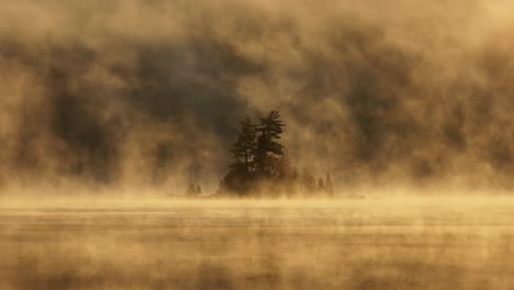 magical scene of morning fog rising off lake onawa