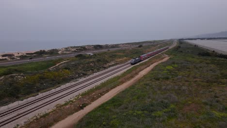 railway tracks and highway 4 on the mediterranean coast in megadim moshav, israel