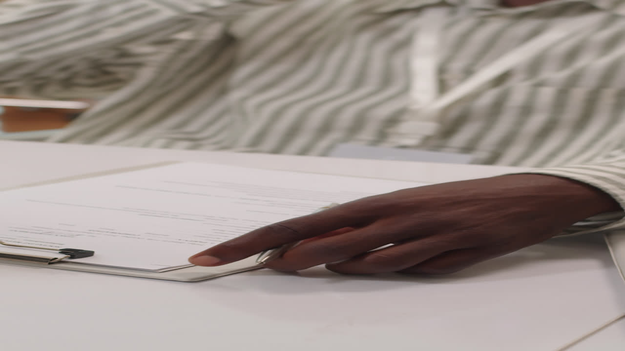 Male Consultant Talking to Client on Smartphone