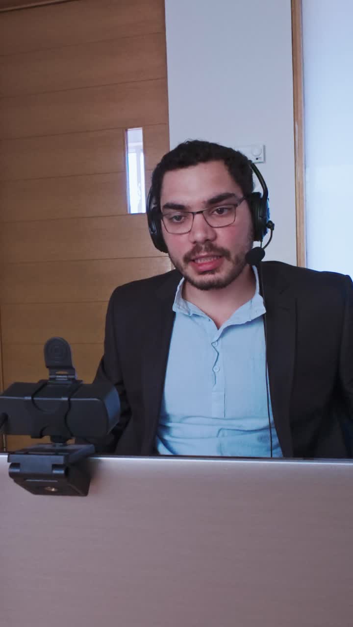 Businessman Speaking Passionately During a Virtual Meeting