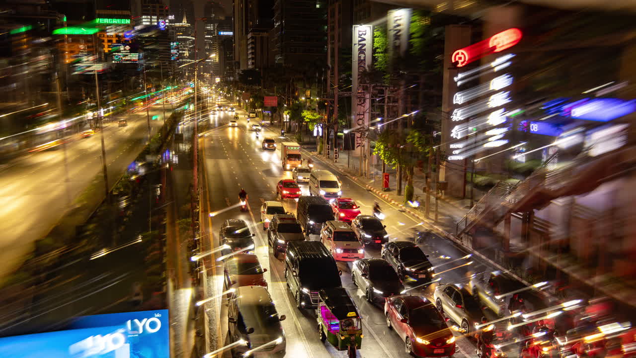 timelapse of rush hour traffic in central bangkok at night