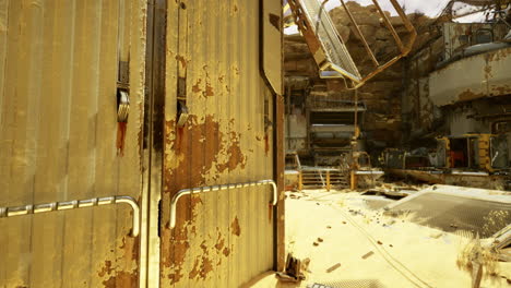 the view showcases an industrial area filled with faded and damaged structures