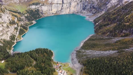 aerial view of turquoise glacier lake oeschinensee