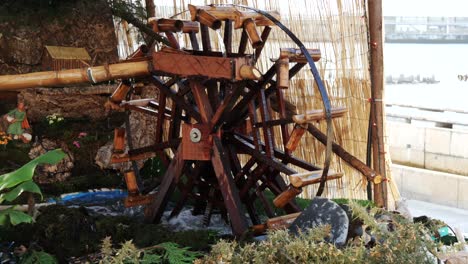 spinning watermill christmas decoration on the street in madeira island