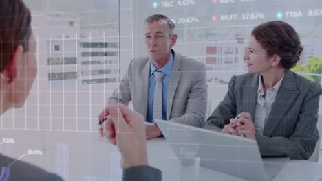 animation of stock market data processing against diverse businesspeople discussing at office