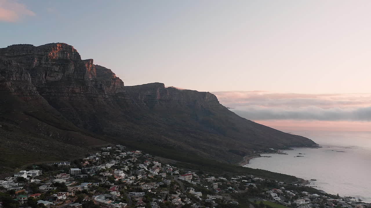 Aerial of Bakoven With in the background Table Mountain (Nature Reserve) with Sunset in Cape Town
