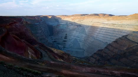 wide shot of the kalgoorlie boulder super pit from the lookout at sunset, mining city in western australia, australia