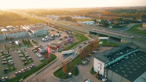 aerial shot on a logistics park with a warehouse - a loading hub