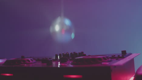 dj setup with disco ball