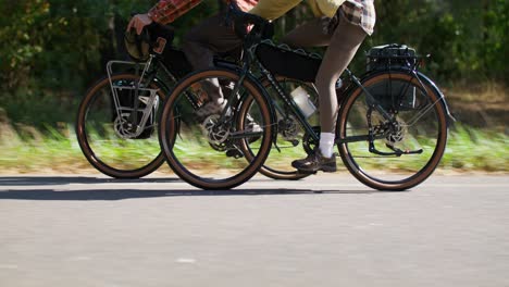 couple cycling on a road bike