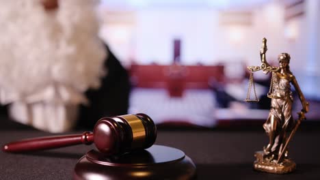 an intense and powerful courtroom scene showcases a traditional gavel